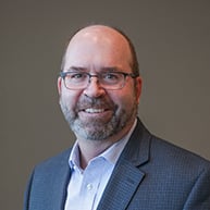 A headshot of Northern Plains Railroad Executive VP of Marketing, Sales, and Corporate Development Dan Mack