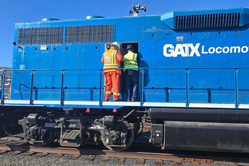 Two NPRS workers going through training process