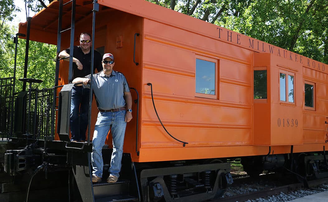 Jesse poses with NPR’s Chief Mechanical Officer Brent Bader at Itasca, IL, in June 2018 while visiting customers in the Chicago area.